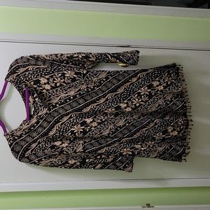 Black and tan tunic with beaded fringe